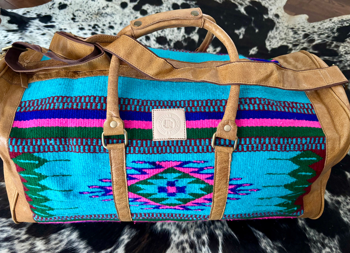 R & R leather duffles